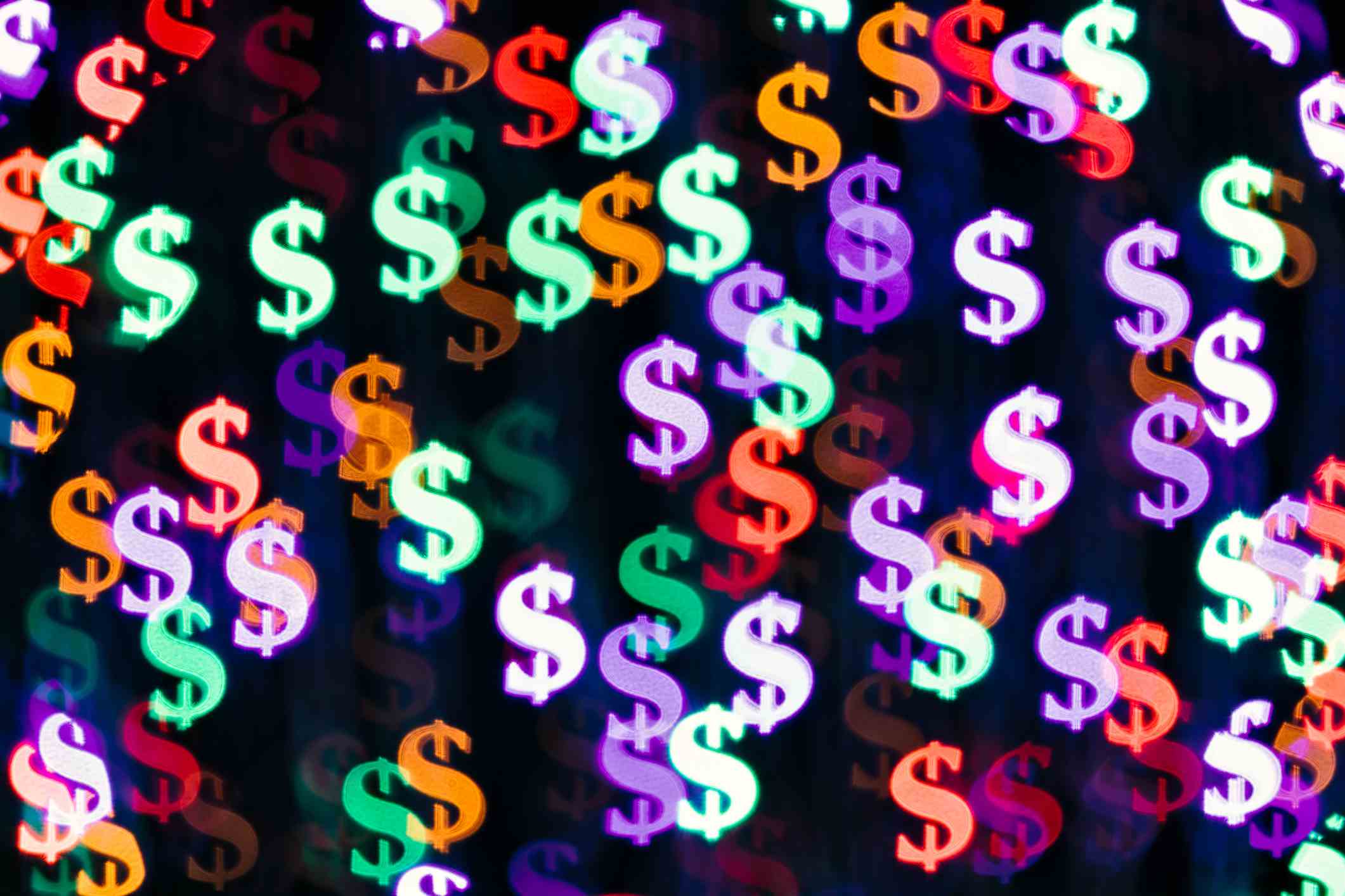 Mehrfarbige Bling Bling Dollarzeichen Form Bokeh Hintergrund auf dunklem Hintergrund, Finanzkonzept.