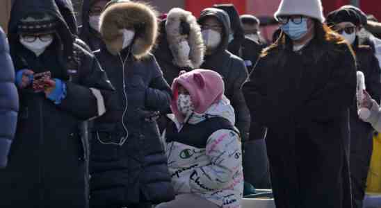 China sagt 200 Millionen behandelt Pandemie „entschieden besiegt
