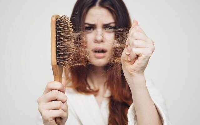 If your hair is shedding 100 strands a day beware