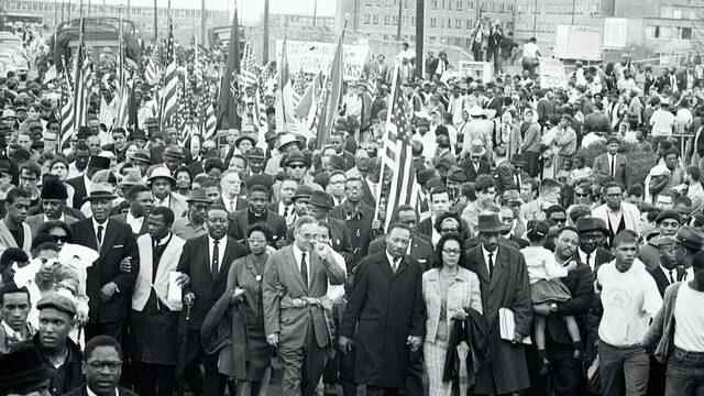 Dr.  Martin Luther King Jr (centre) led more than 10,000 people on the final leg of the march from Selma to Montgomery.