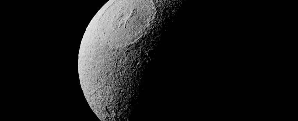 Mimas the other moon of Saturn which would hide an