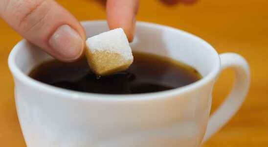 Why does sugar dissolve better in hot water than in