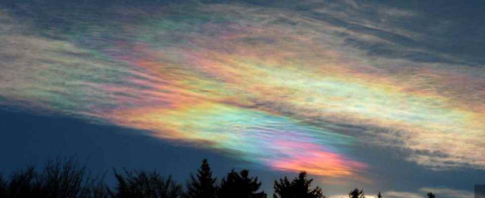 Extraordinary weather phenomenon iridescent clouds