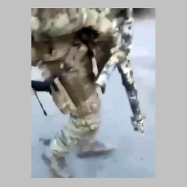 soldier with camouflage weapon