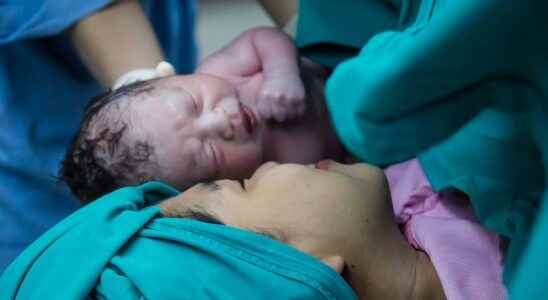 Childbirth the birth of a baby