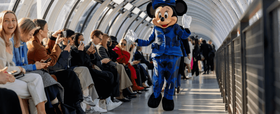 Minnie parades at Fashion Week in a Stella McCartney suit