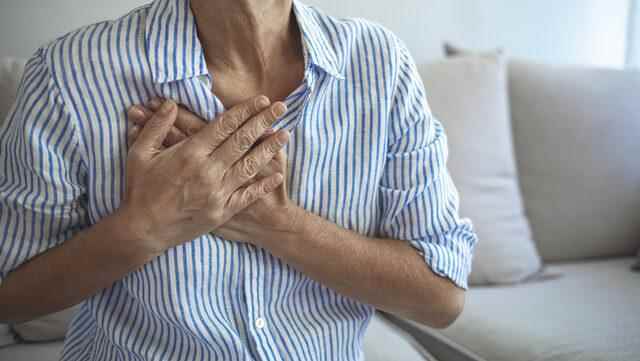Symptoms are chest pain numbness and sweating What is a