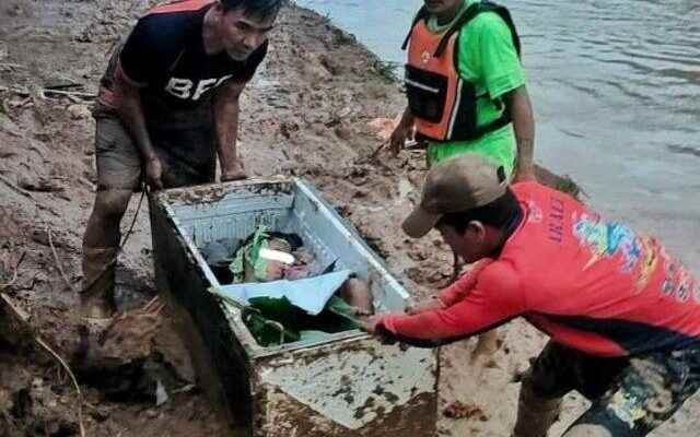 11 year old boy survived landslide in Philippines by hiding in refrigerator