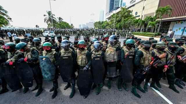 Soldiers guarding the presidential building in the capital Colombo this week