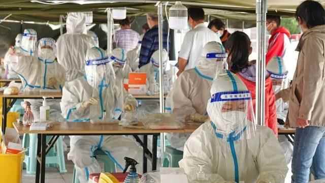 Health professionals working on batch testing in Chandong province