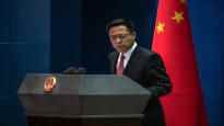China which opposes NATO is hotly debating Finlands decision to
