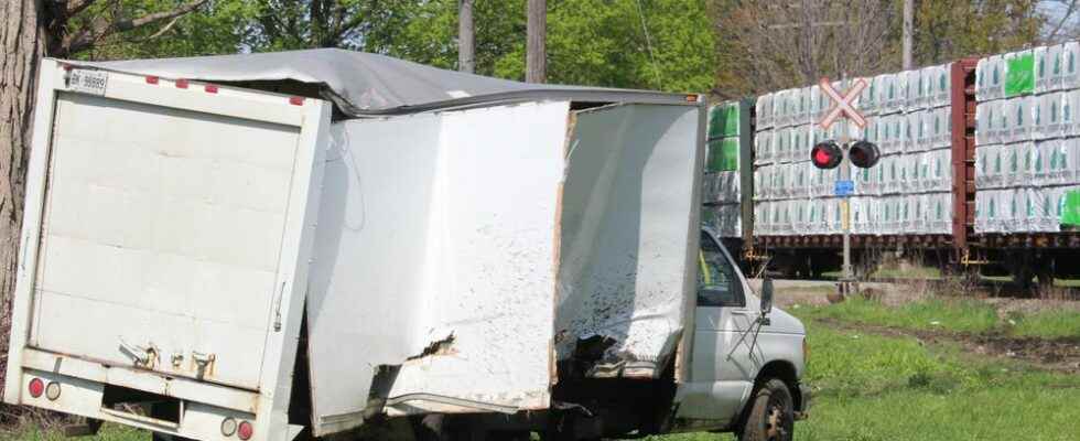 Cube van struck by freight train in Chatham