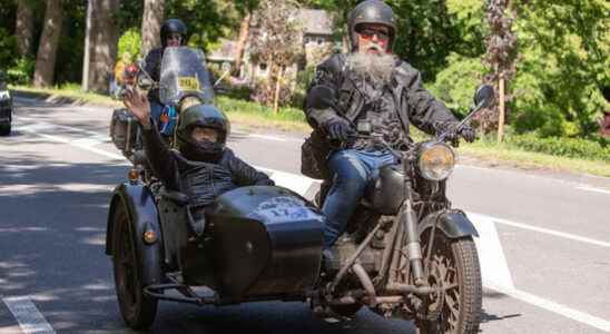 In the sidecar motorcycle tour for people with disabilities can