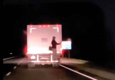 Police investigating after person hitches ride on back of truck