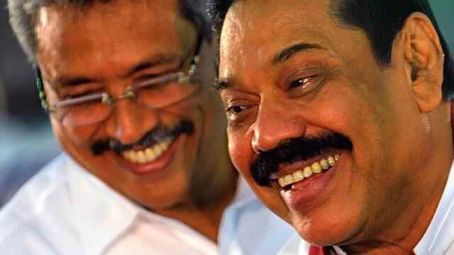 Gotabaya (left) and Mahinda Rajapaksa in 2013: Now seen as the chief culprit of the economic crisis