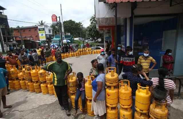 People line up to buy bottled gas in Sri Lanka
