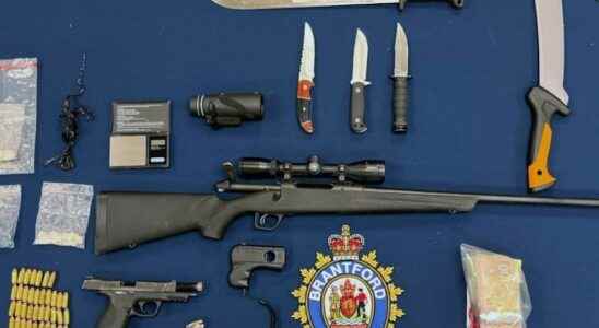 Police sixteen weapons over 20000 in illegal drugs