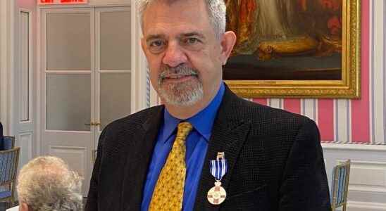 Theater company founder receives Meritorious Service Medal