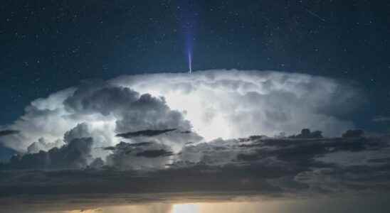 A gigantic blue jet departing from a storm cloud has