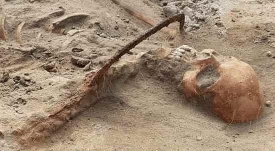 A vampire woman found buried with a sickle on her