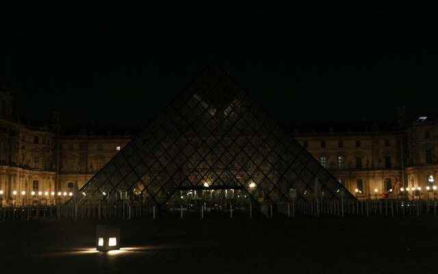 Energy saving decision in France Louvre Museum pyramid lights were