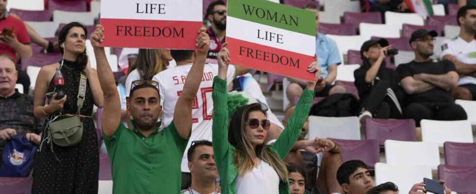 the eleven iranian players refrain from singing their anthem