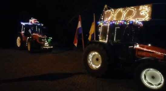 Dozens of farmers with decorated tractors past care homes That