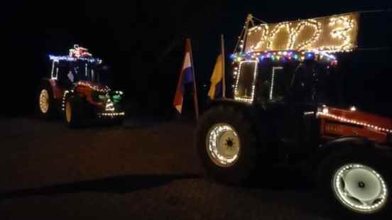 Dozens of farmers with decorated tractors past care homes That