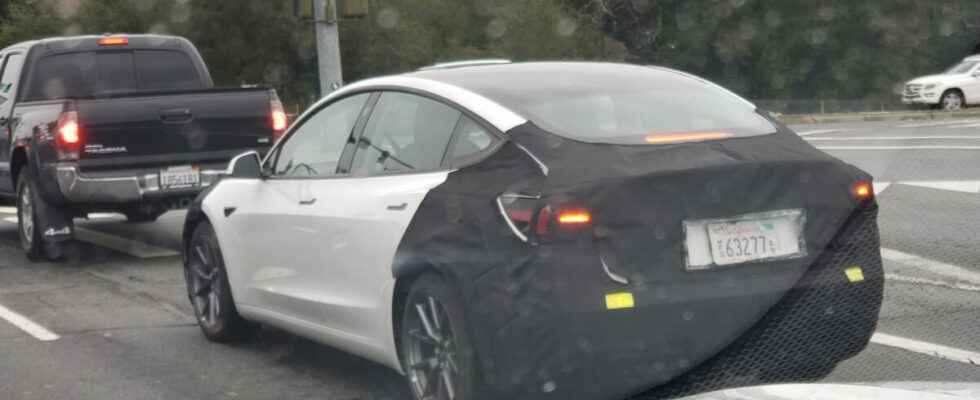 Renewed Tesla 3 Displayed in Traffic